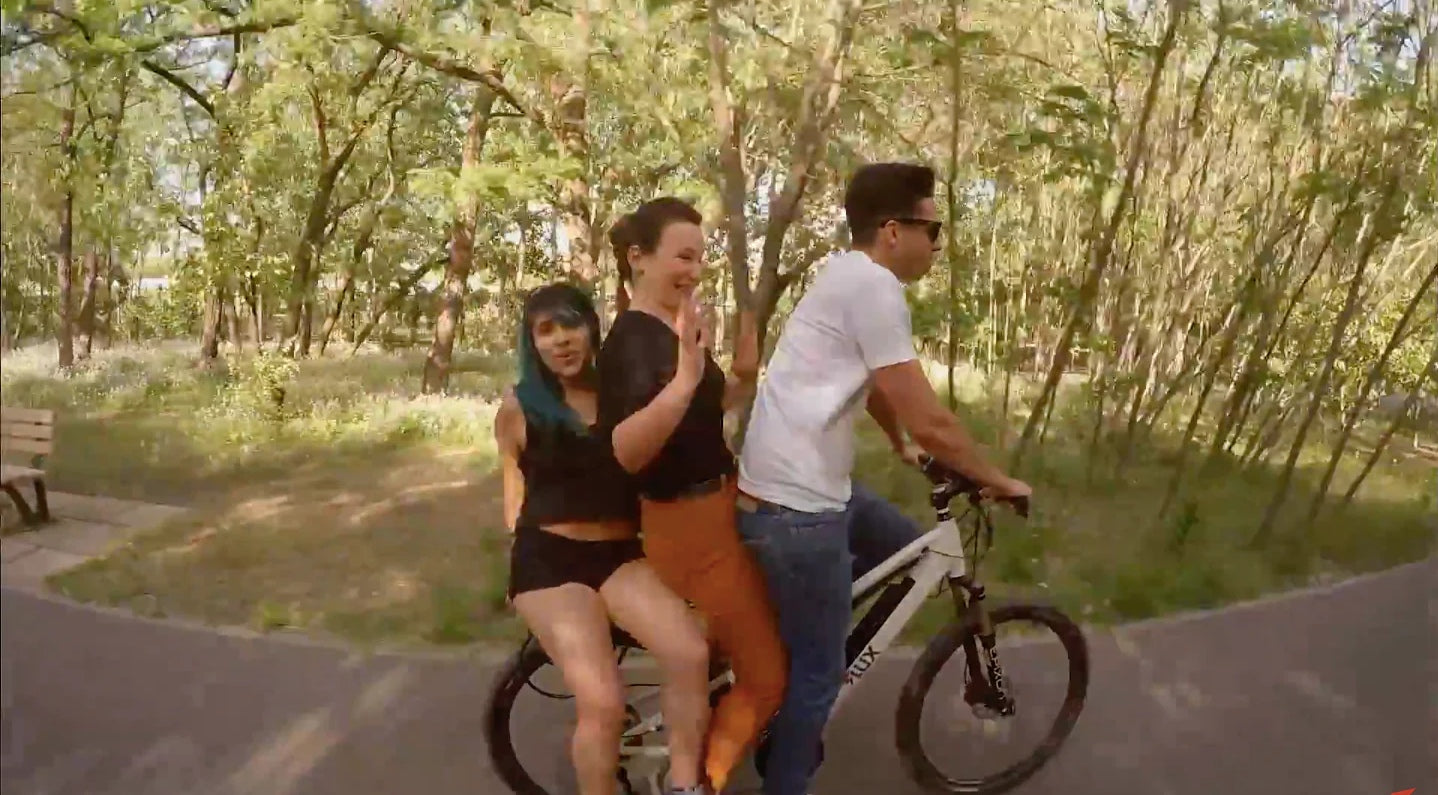people on superhuman ebike