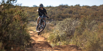 Man riding electric Mountainbike on trail